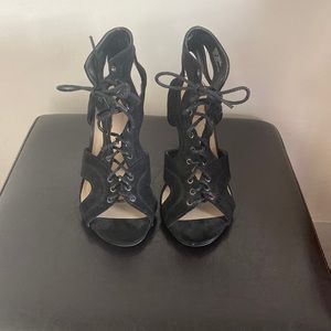 black lace up wedge heels.